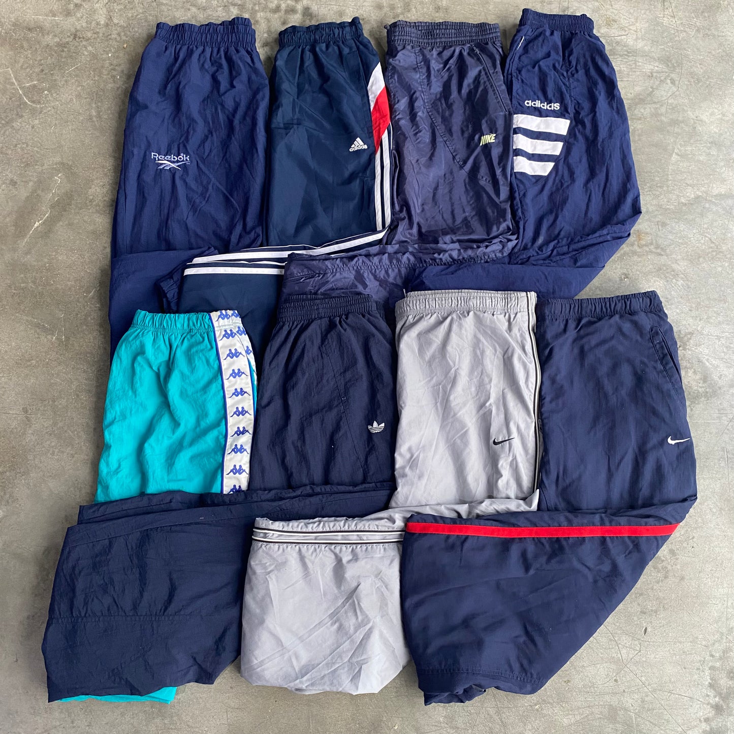 Track Pants de Marca Premium - Europe Wholesales