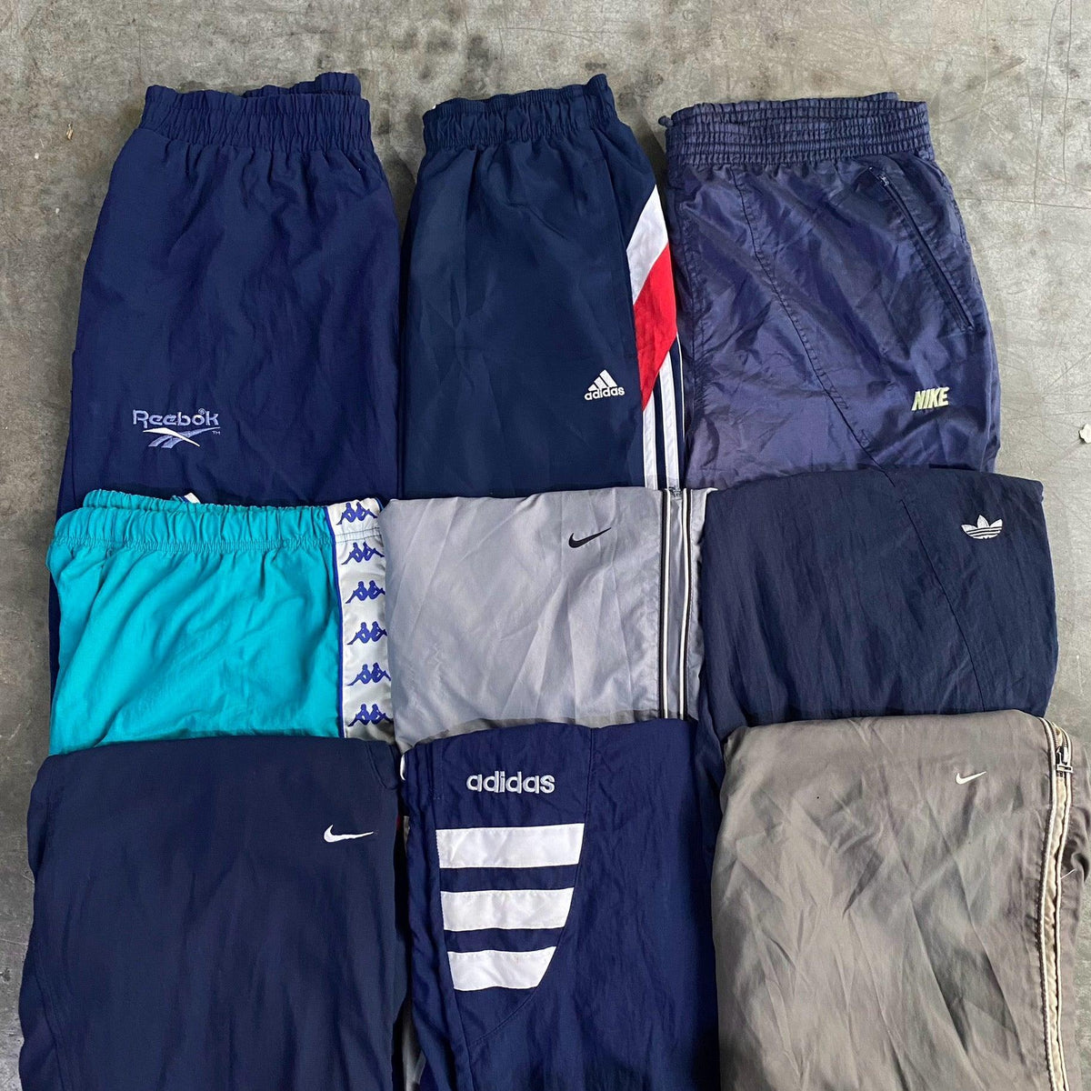 Track Pants de Marca Premium - Europe Wholesales